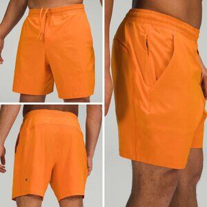 Lululemon Men’s Pace Breaker Linerless Shorts 7” Inseam in Rush Orange, Size L
